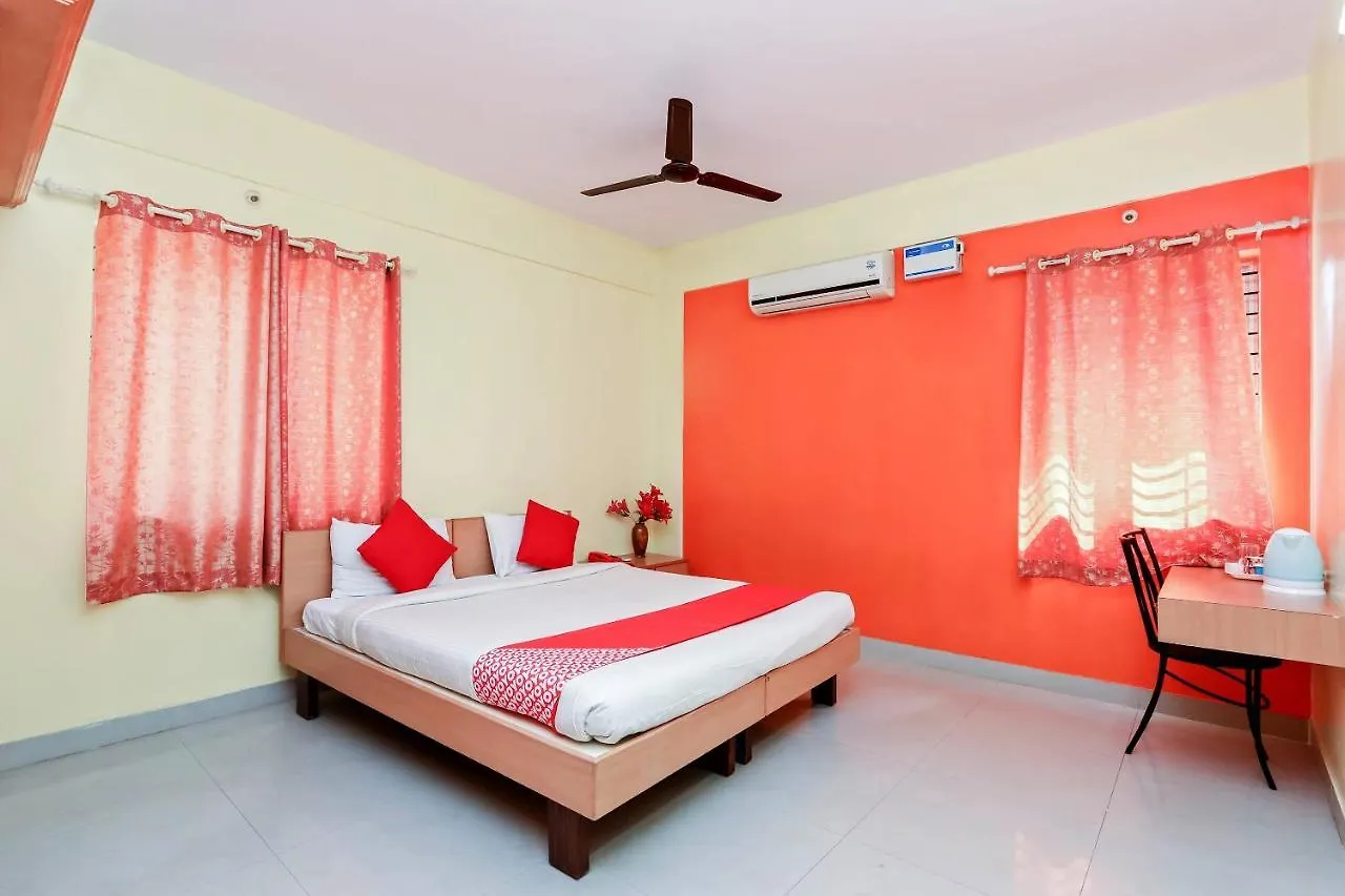 Oyo 24195 Jasmine Suites Mysore